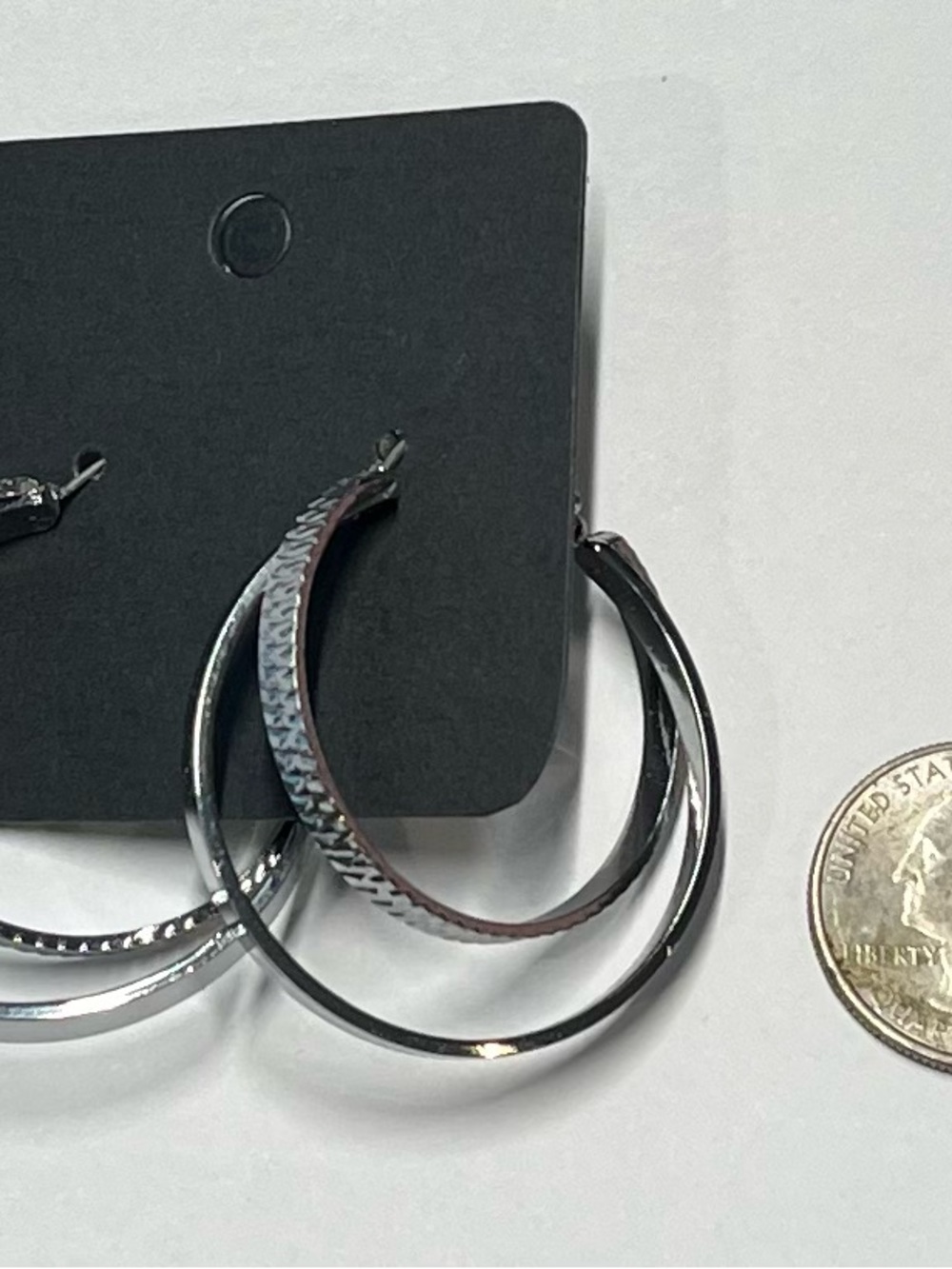 Large Hoop Style Silver Colored Earrings